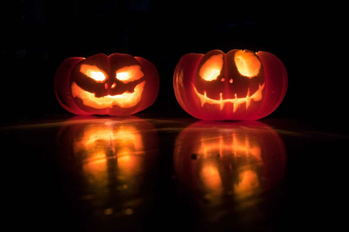 Carved pumpkins with candles inside.
