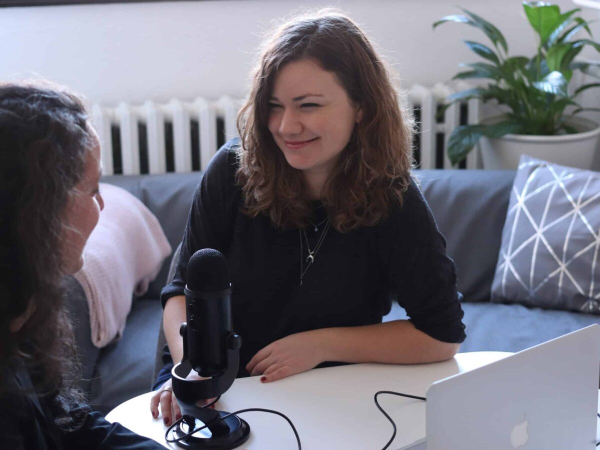 two women recording a video podcast