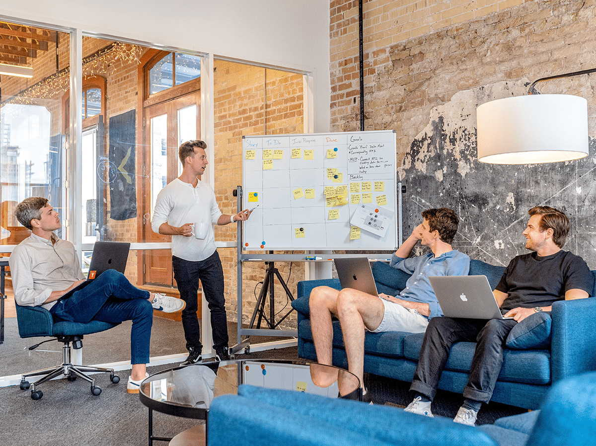 Four men at a business meeting.